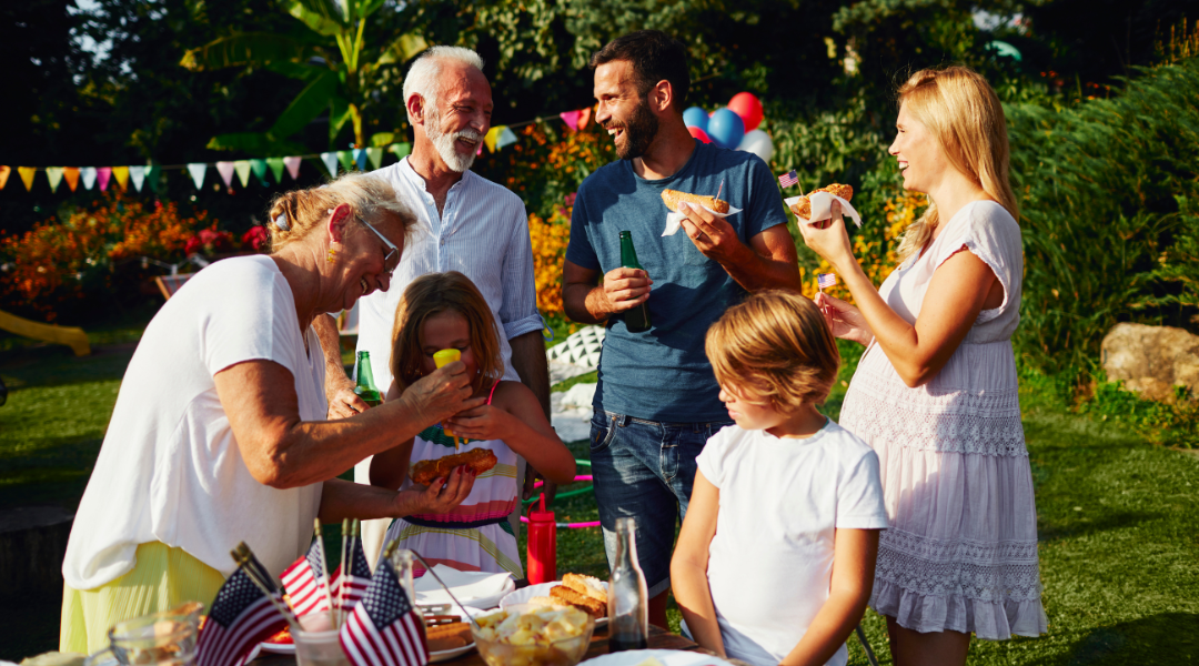 Family eating at a July 4th BBQ