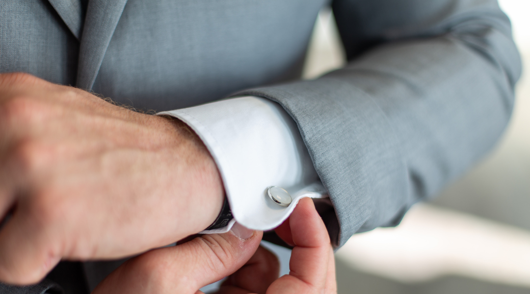 A man wearing cufflinks