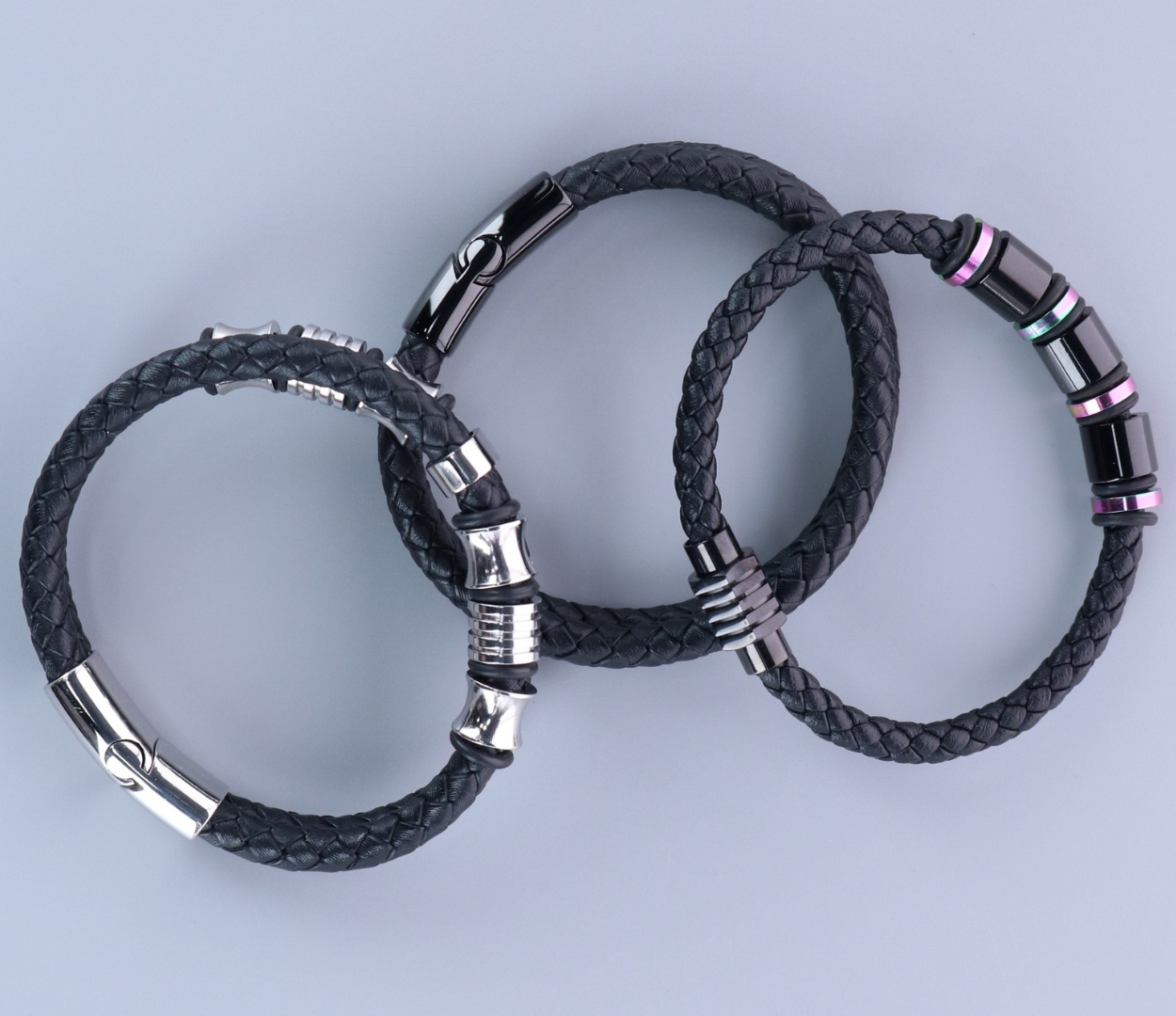 three black leather bracelets
