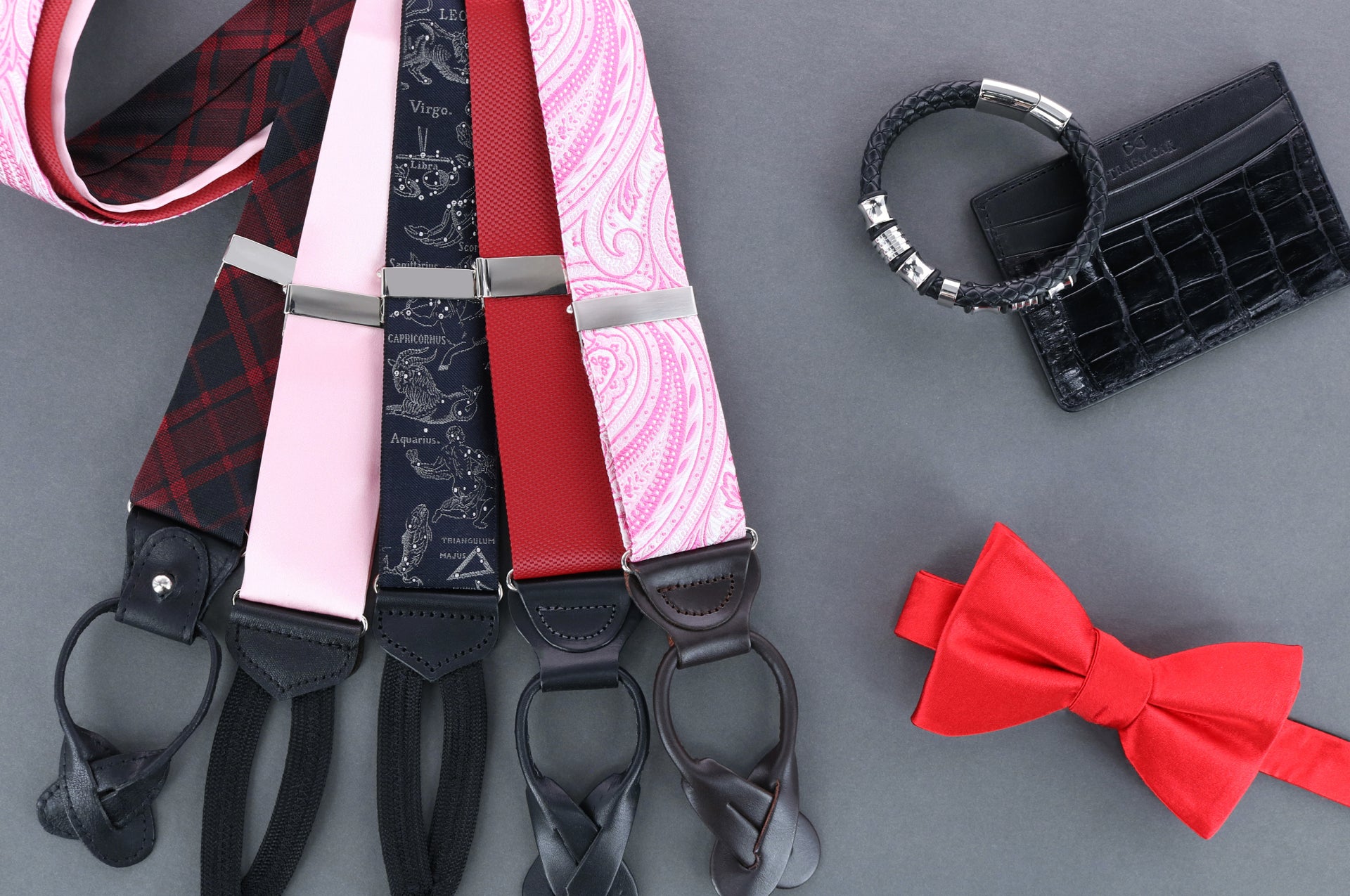 Five pairs of braces, a bow tie, leather bracelet and card holder