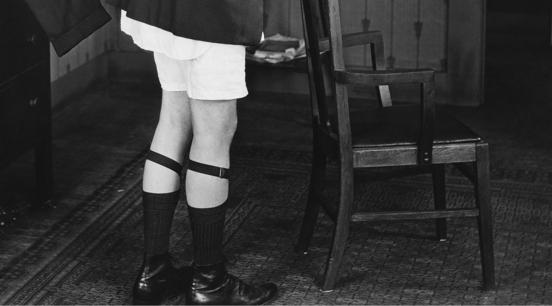 Man wearing sock garters