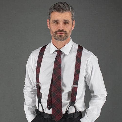 Man wearing braces and bow tie