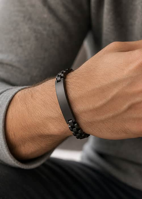 Man wearing metal bracelet 