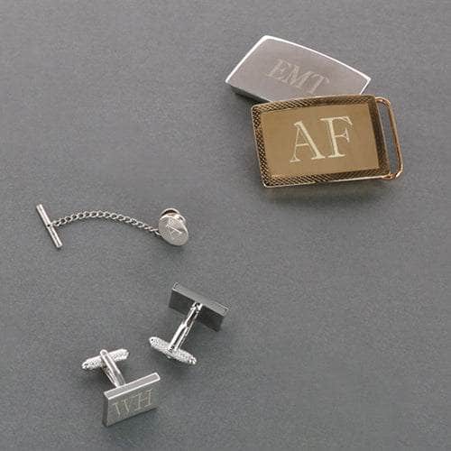 Monogrammed belt buckles, cufflinks and tie tack