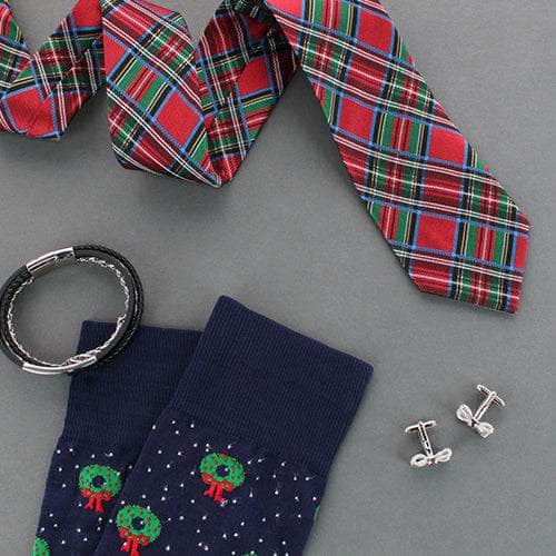 Nicholas necktie, holiday wreath dress socks, bracelet, and bow tie cufflinks